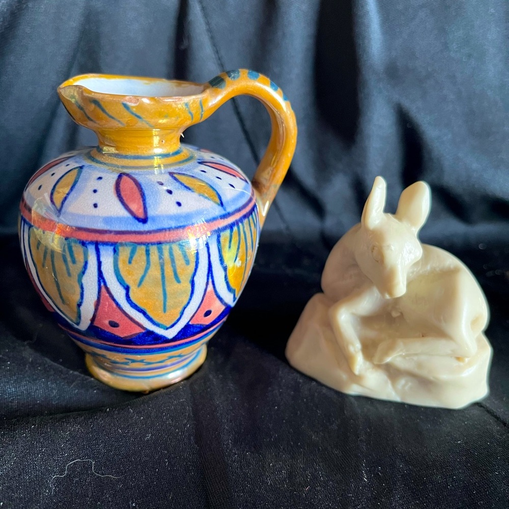 vase made in Italy and carved dear 2 for 1.  charming decor